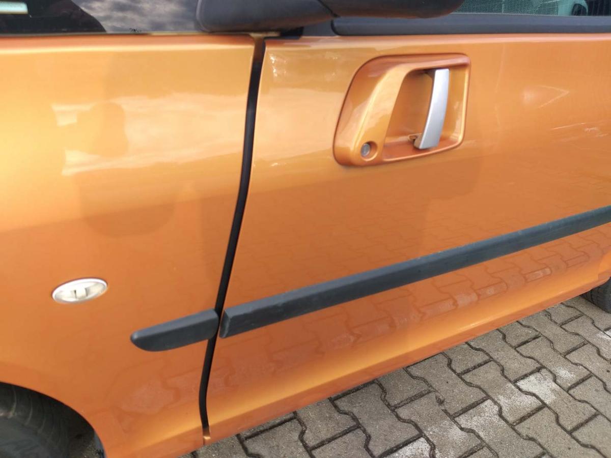 Peugeot 1007 original Tür links KHW Orange Salamanque Bj.2005